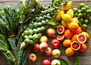 a group of fruits and vegetables on a wood surface Healthy Weight Loss Diets Ampthill